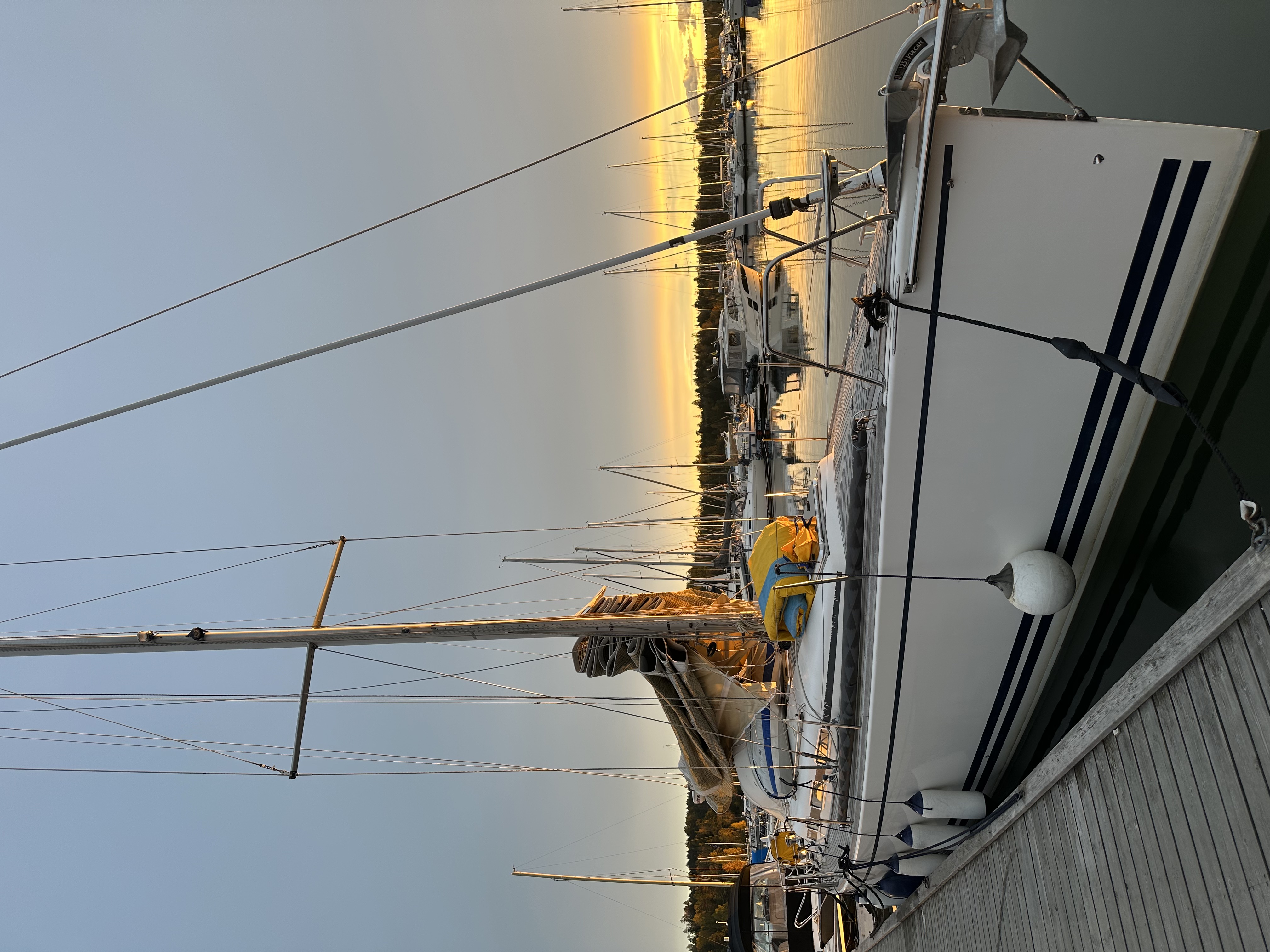 Iris moored at Karlslund Marina at golden hour